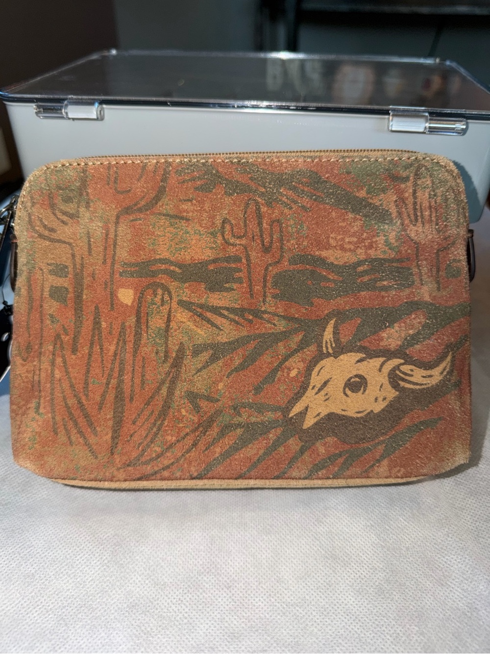 Womens Suede Desert Print wristlet clutch type or accessories bag. Brown